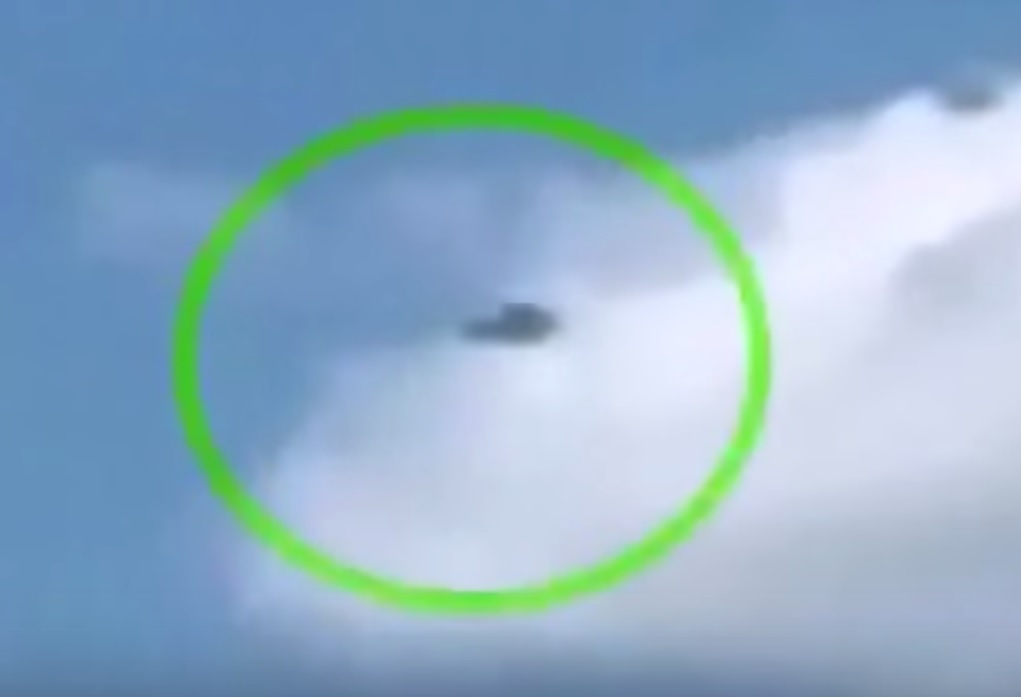 Airplane Landing UFO Sighting UFO Creates Smoke Ring In A Cloud